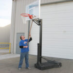 First-Team-OmniChamp-Portable-Basketball-Hoop-Adjust-1