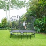Springfree-11ft-x-11ft-Large-Square-Trampoline-Front-W-Kid
