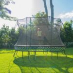 Springfree-8ft-x-13ft-Large-Oval-Trampoline-Front-W-Kid